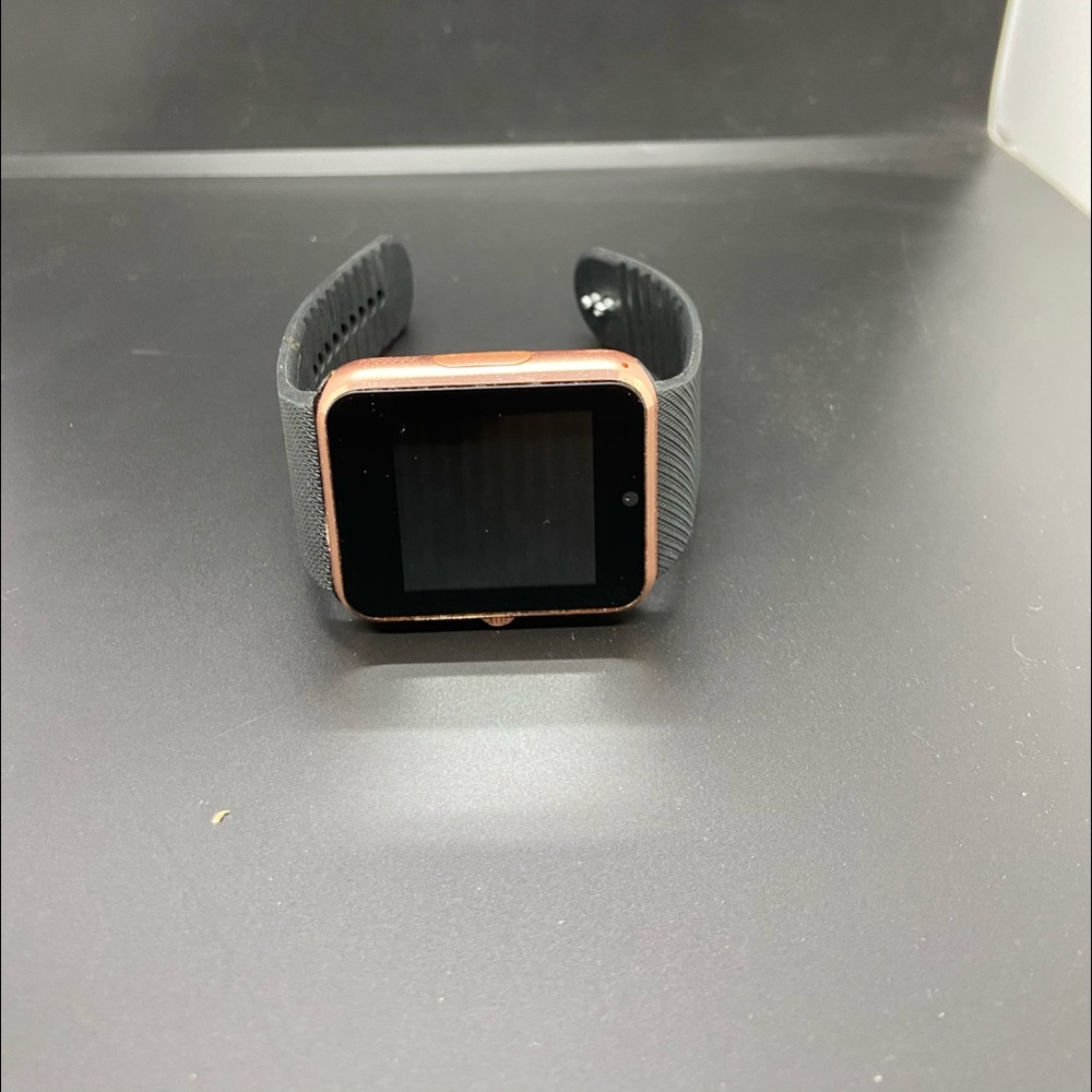 Smart Watch and phone! Charger comes with it